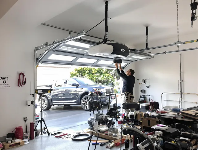 Azusa Garage Door Repair specialist installing smart garage door opener system in Azusa home