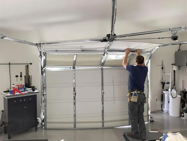 Azusa Garage Door Repair specialist performing precise section replacement on Azusa garage door