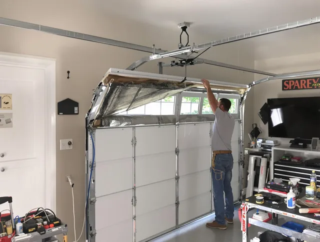 Garage door section replacement by Azusa Garage Door Repair in Azusa